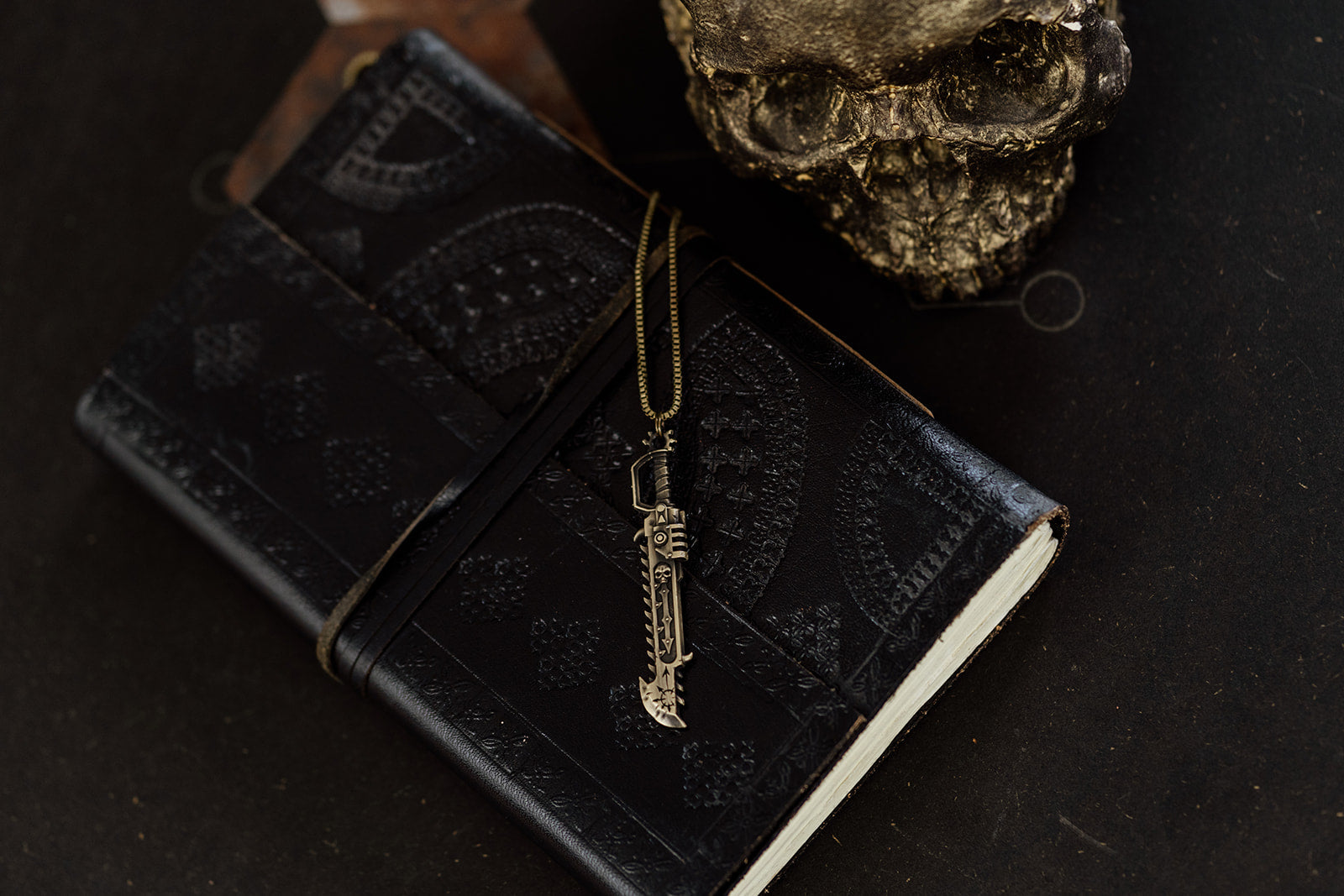 Forged for the Grimdark: Warhammer 40K Chainsword Pendants by ValourCraft